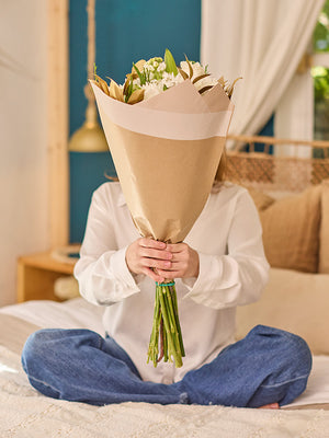 Woman holding Paper Flower Sleeve in color Natural