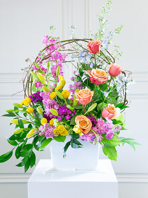 White rectangular plastic basket with flowers